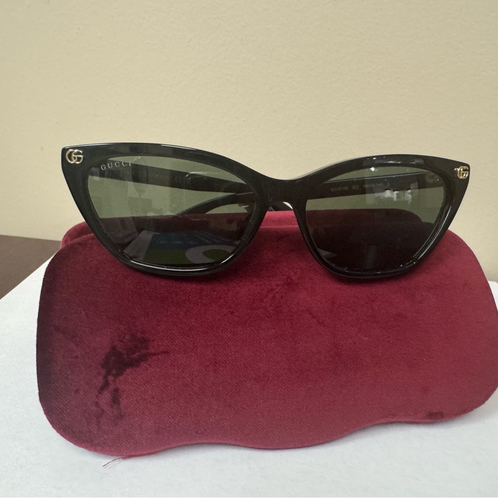 Gucci Black Cat-Eye Sunglasses with Gold Accents